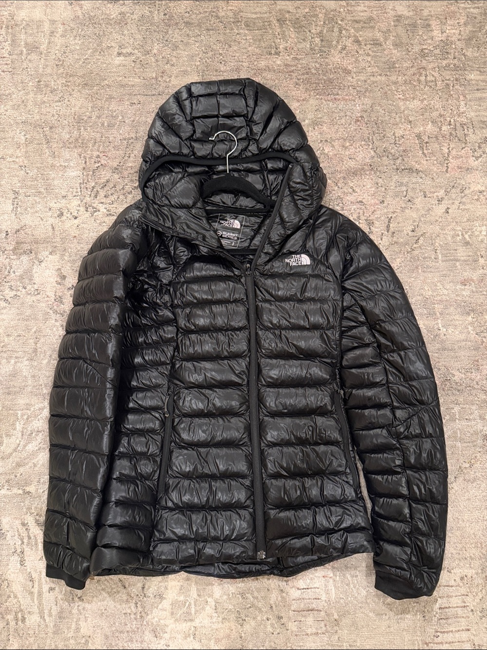 The North Face Women's Shiny Black Summit Series Puffer Jacket